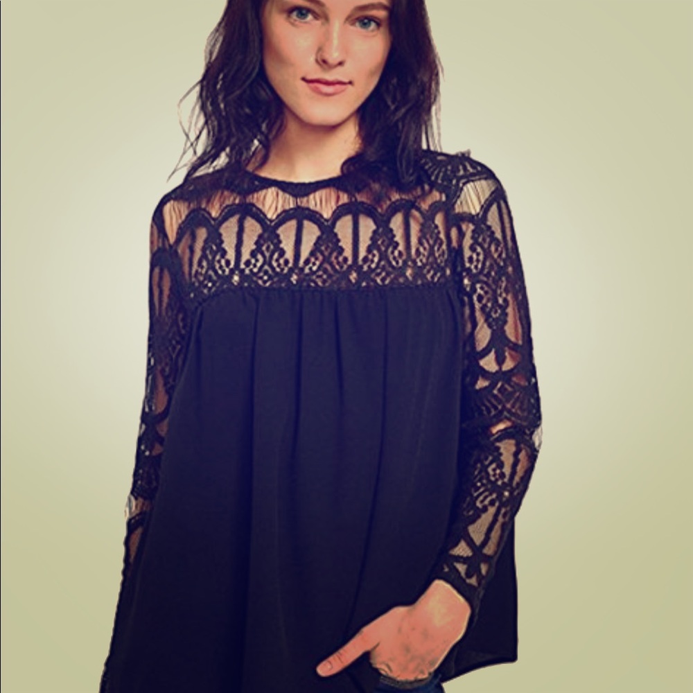 Elegant black top. Great casual or dressy